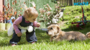 Cute Baby Gets Into Howling Competition With Dogs